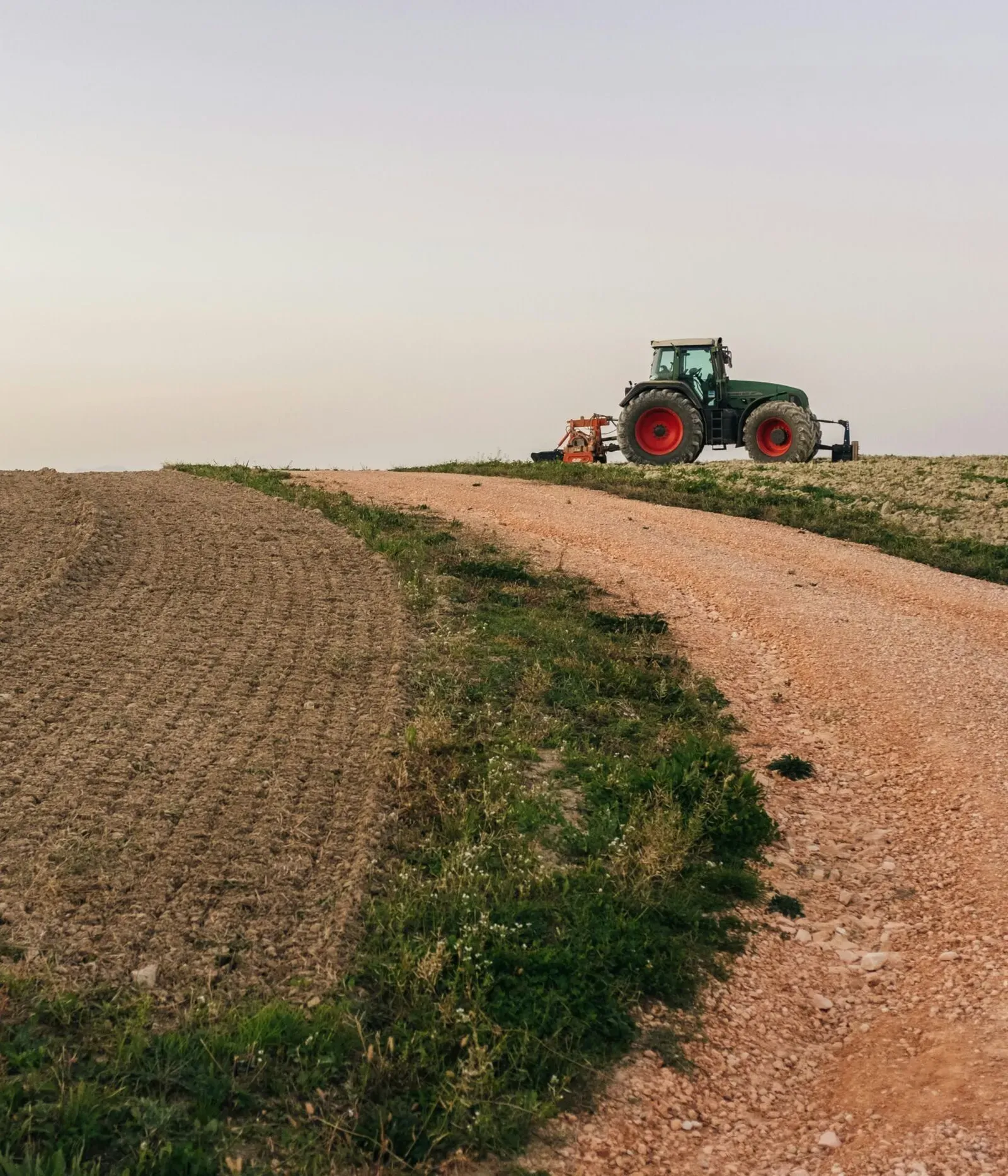A tractor on a dirt road