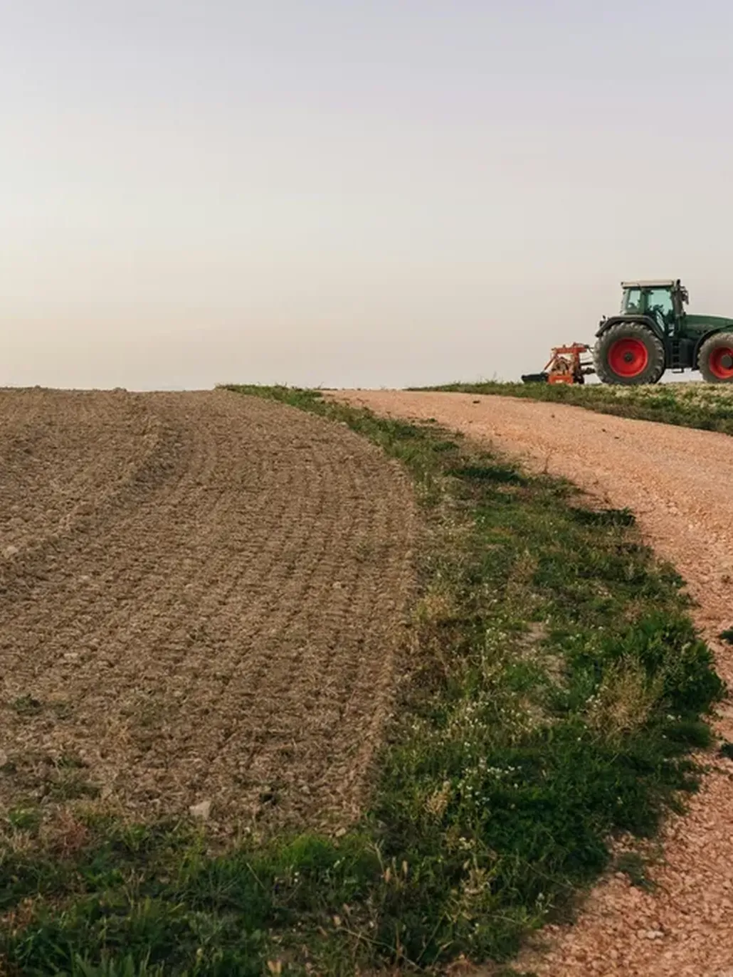 A tractor on a dirt road